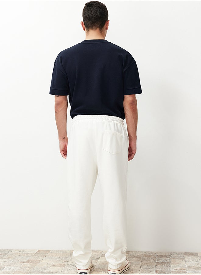 trendyol - Ecru Regular Fit Label Appliqued Pockets Stitched Sweatpants TMNSS23EA00010 - Image 1