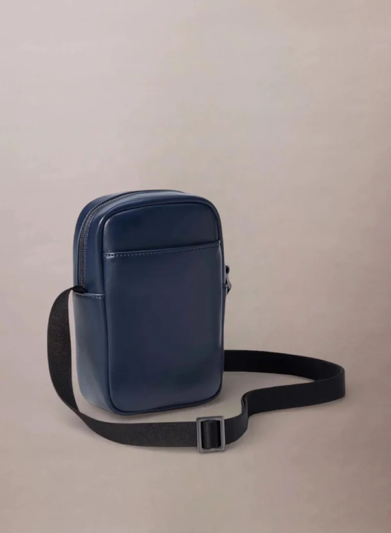 Calvin Klein  Embossed Monogram Logo Slim Reporter Bag for Men | Best Price UAE