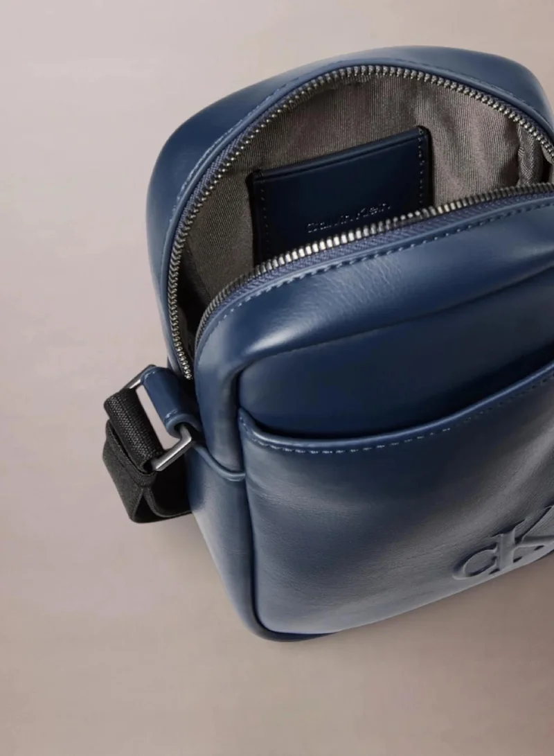 Calvin Klein  Embossed Monogram Logo Slim Reporter Bag for Men | Best Price UAE