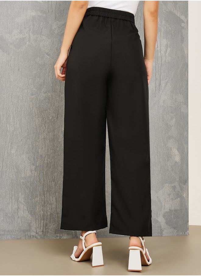 Styli - Solid Wide Leg Pants with Button Closure - Image 1