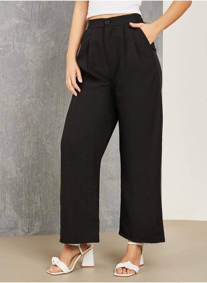 Styli - Solid Wide Leg Pants with Button Closure - Image 1