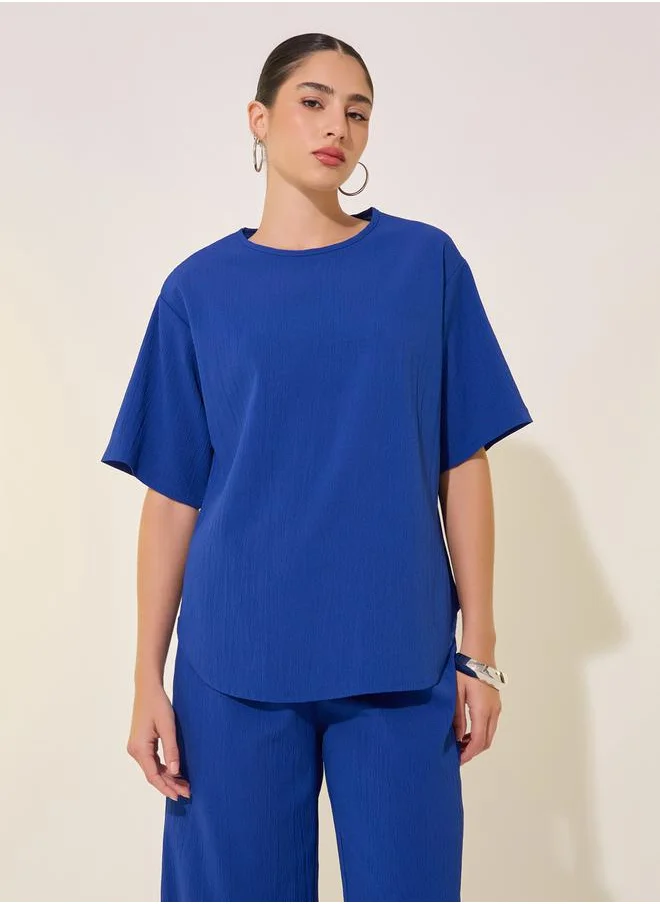 Styli Solid Oversized Round Neck T-Shirt and Pants Co-Ords