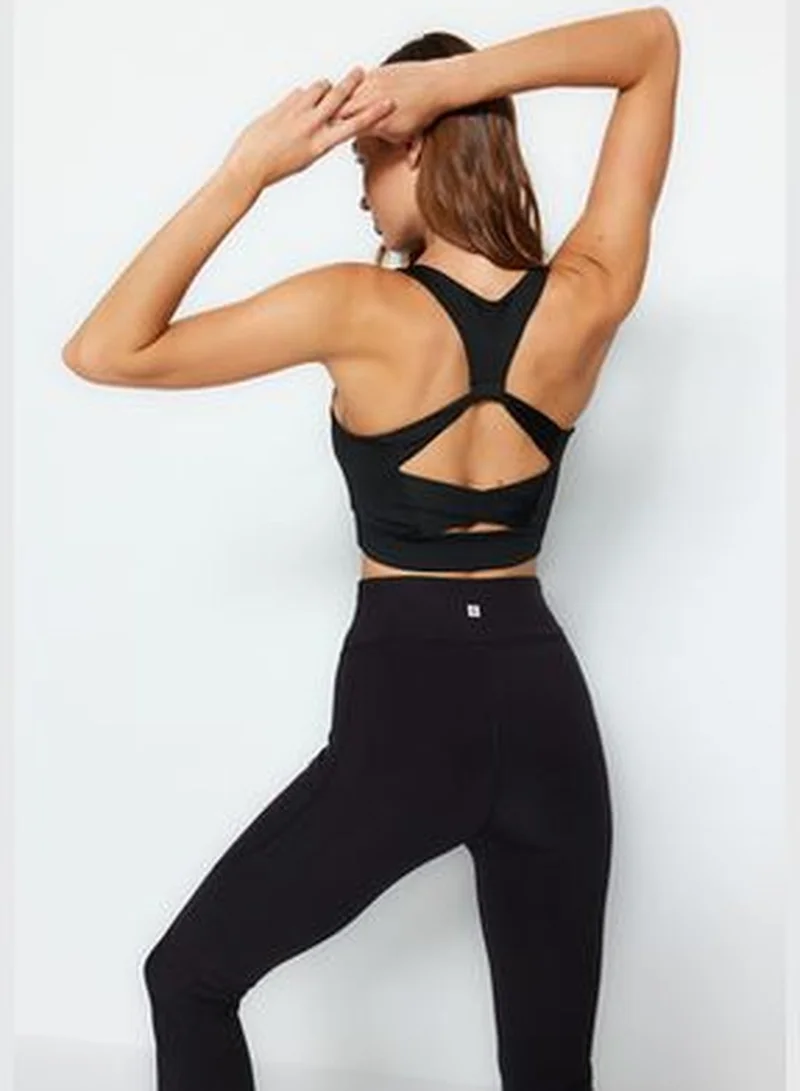 trendyol Black Cross-Strap Detail Support/Shapering Sports Bra THMAW24SS00013