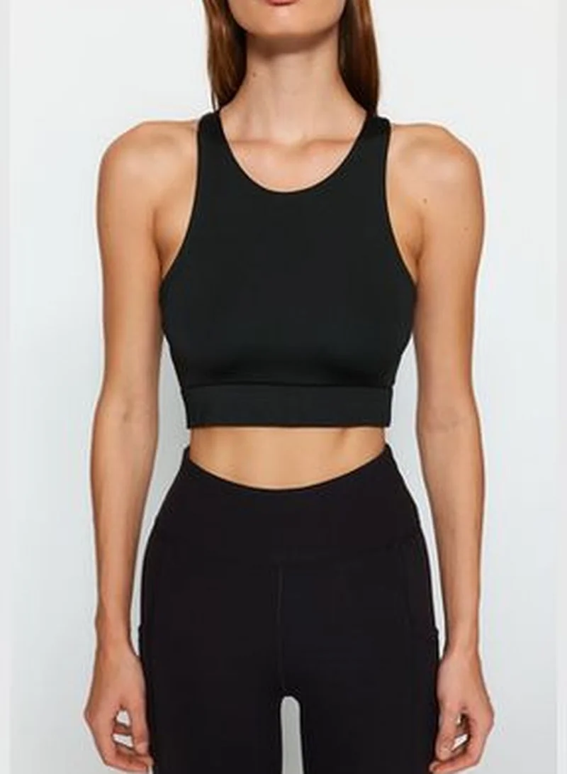 trendyol Black Cross-Strap Detail Support/Shapering Sports Bra THMAW24SS00013