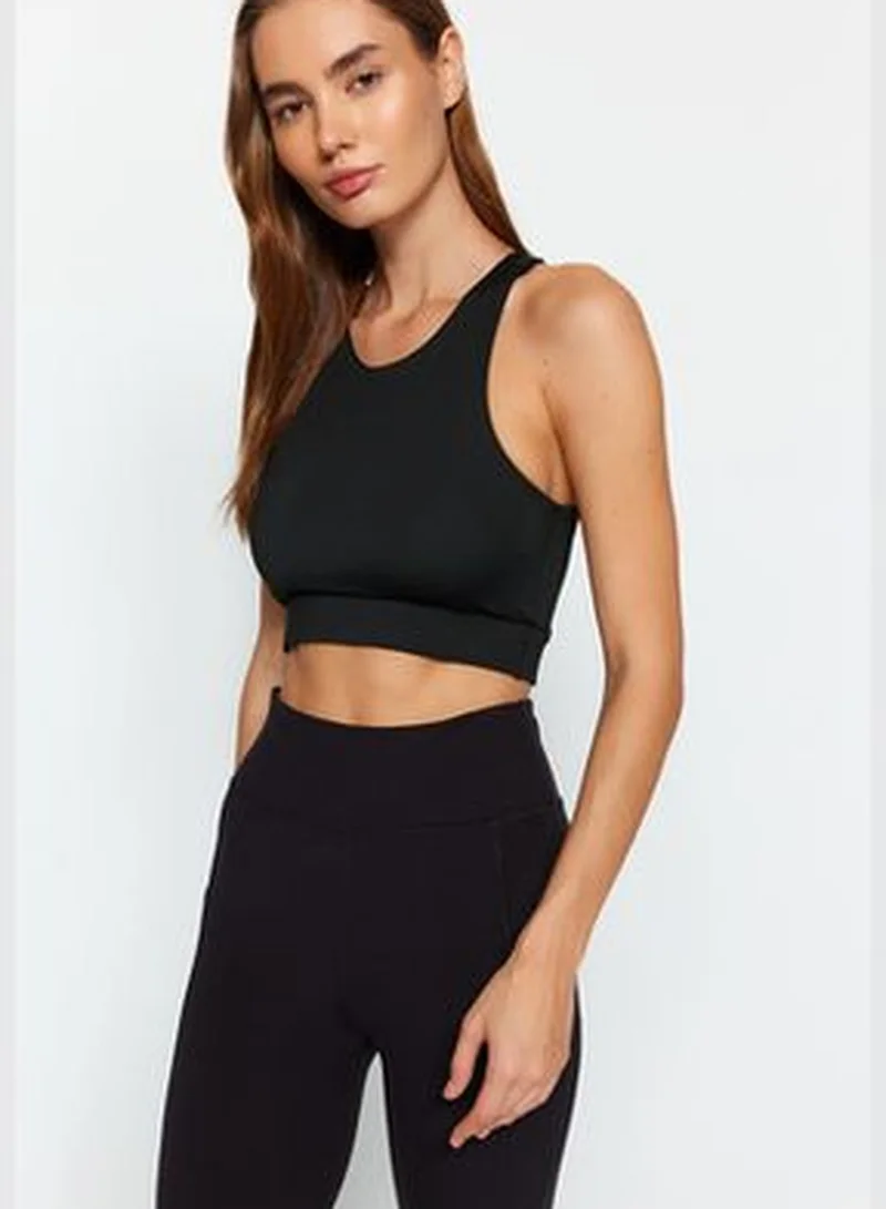 trendyol Black Cross-Strap Detail Support/Shapering Sports Bra THMAW24SS00013