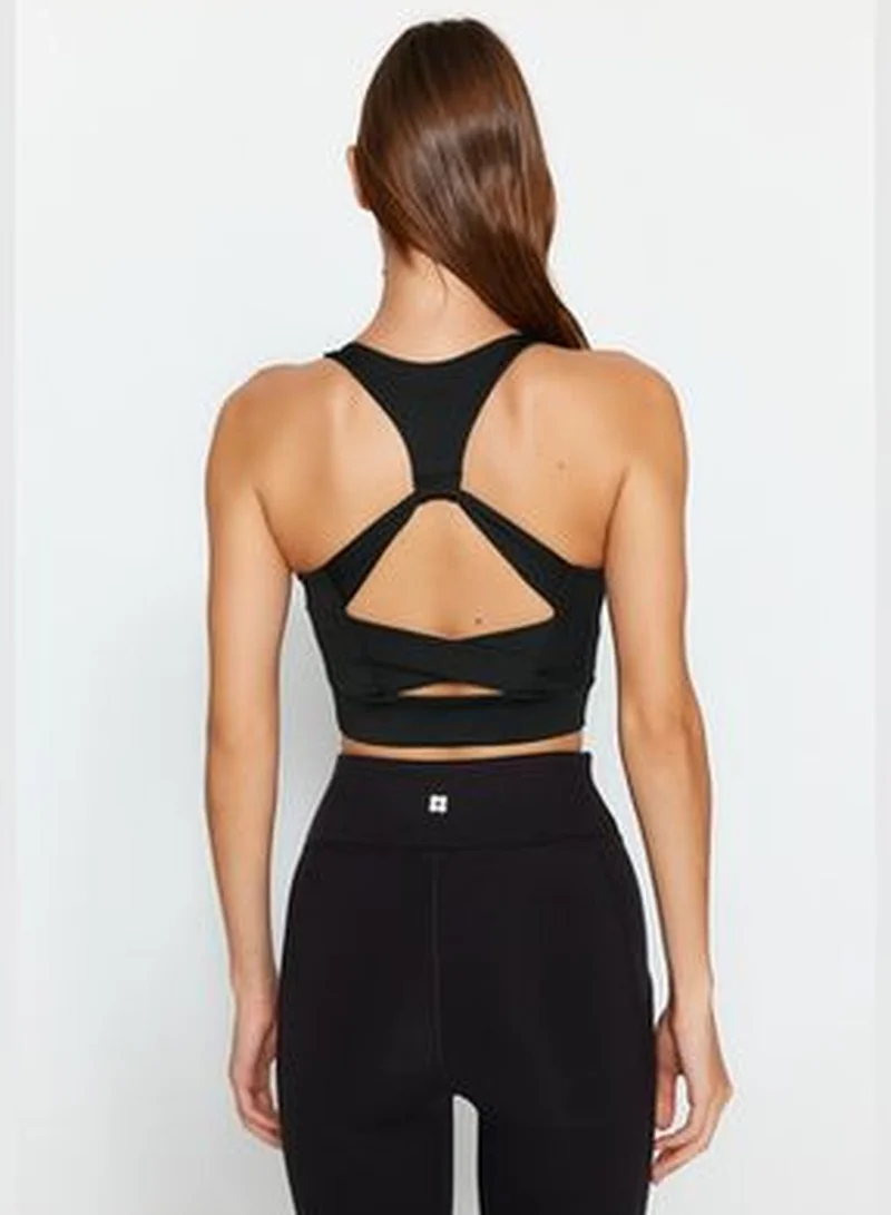 trendyol Black Cross-Strap Detail Support/Shapering Sports Bra THMAW24SS00013