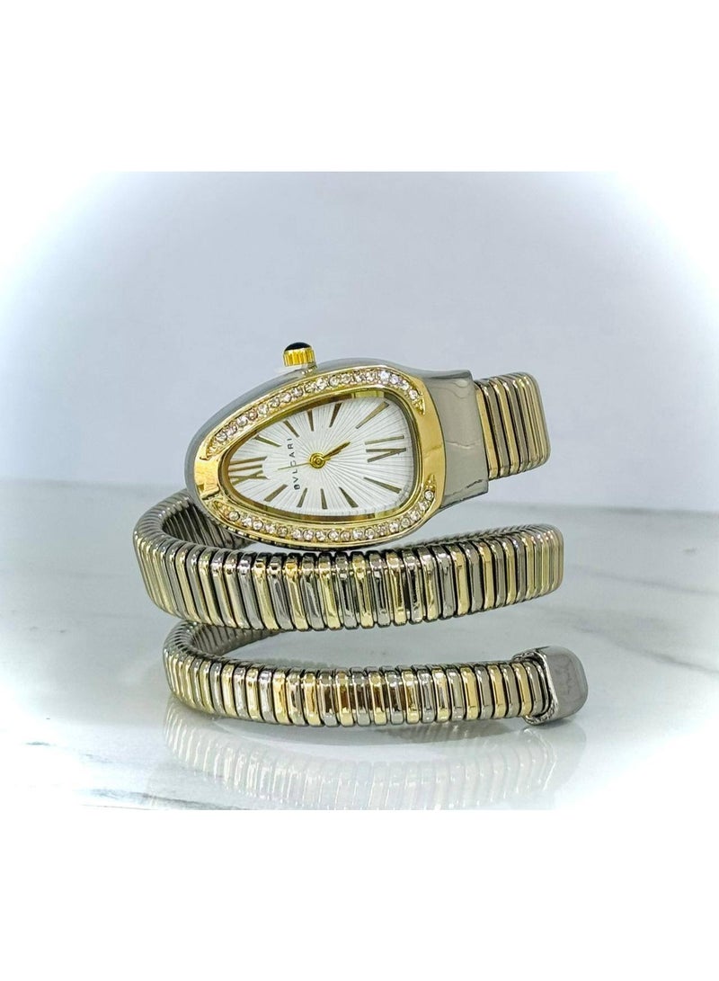 بولغاري ساعة يد حريمي فاشون أنالوج – سوار حلزوني ذهبي وفضي مع إطار مرصع بالفصوص