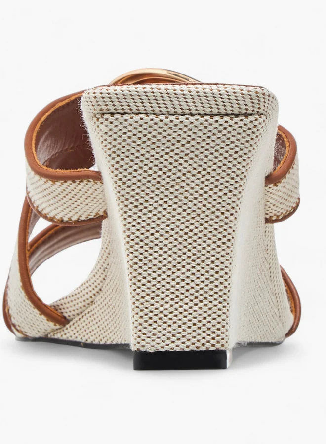 Celeste Women's Textured Slip-On Sandal with Wedge Heel