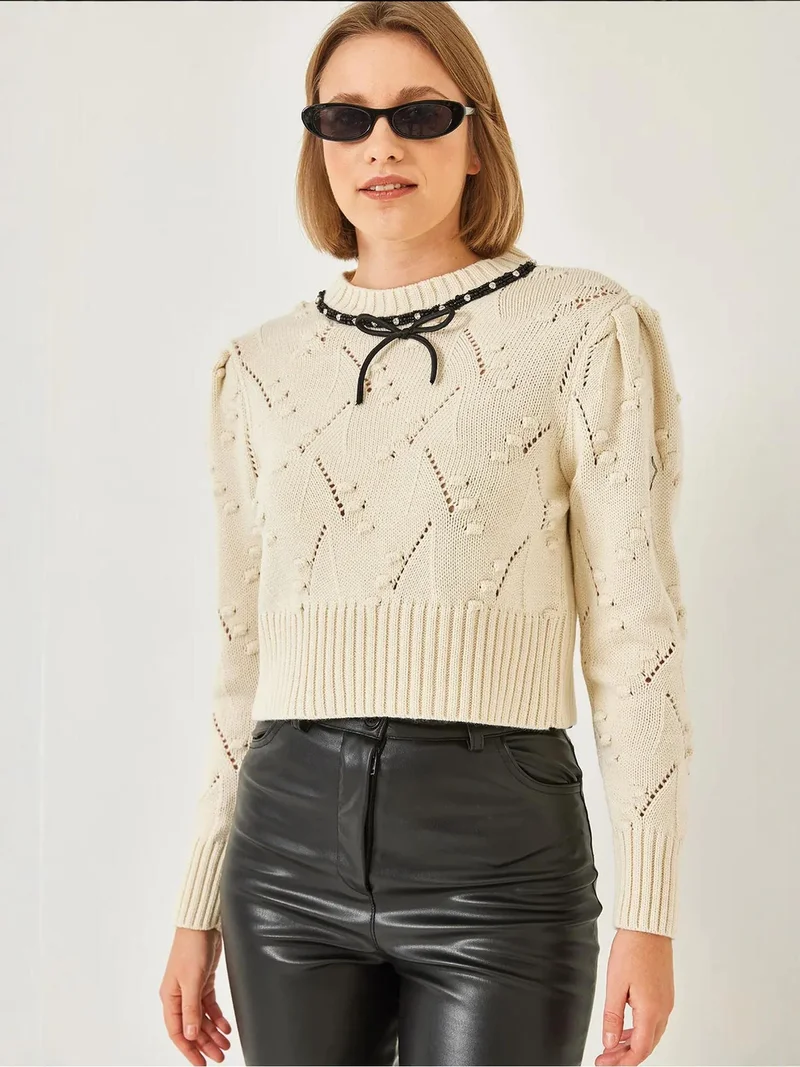 بيانكو لوتشي كنزة قصيرة مطرزة بنقوش  بياقة دائرية