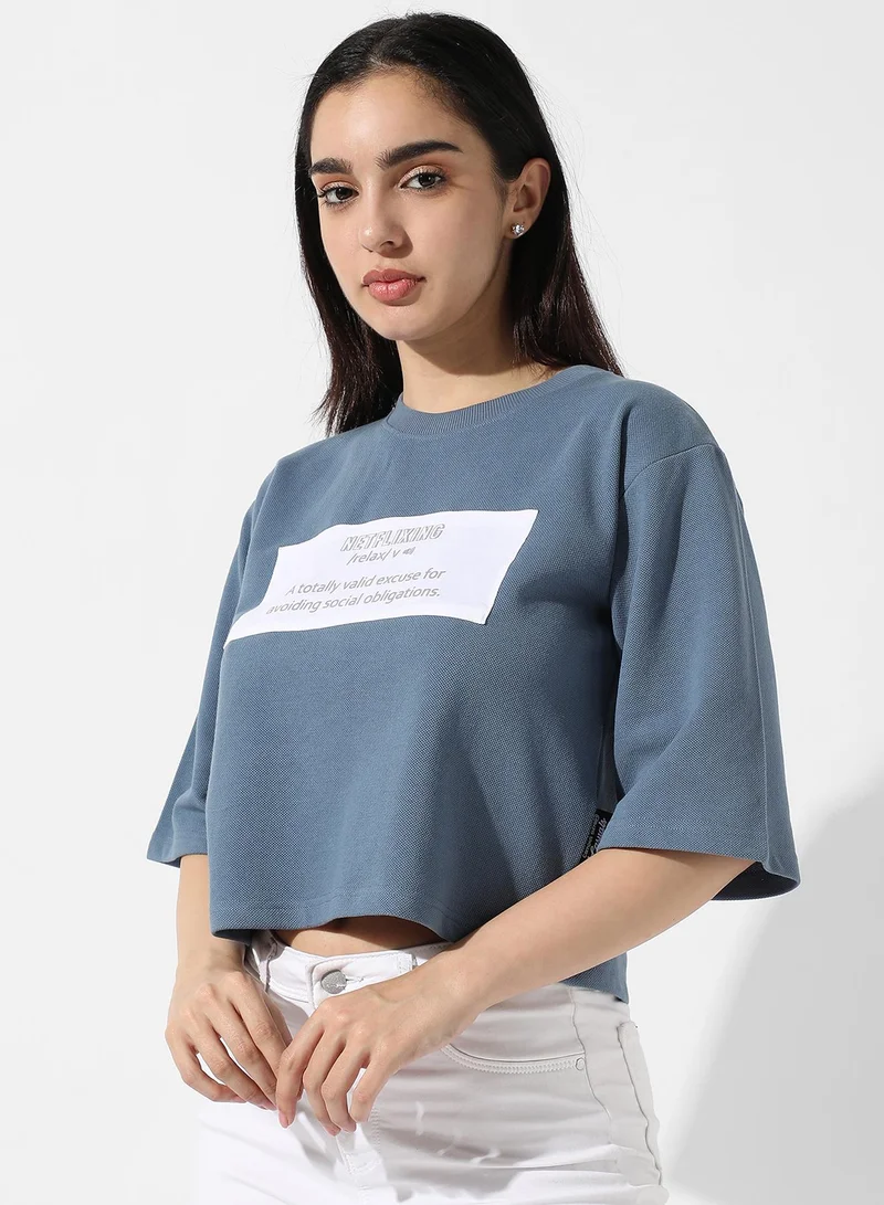 Campus Sutra Women's Icy Blue Typographic Print Top
