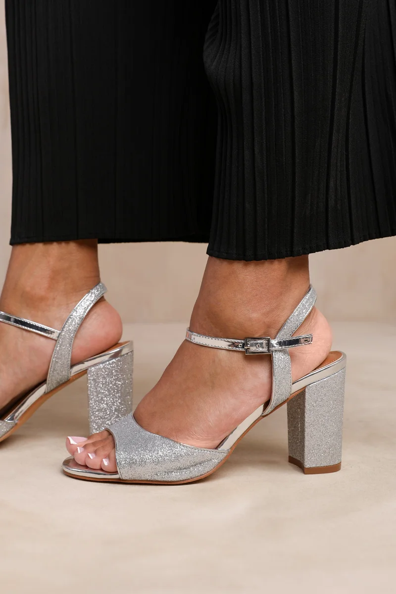 ويرز ذات فروم 'Florence' Mid High Heels With Ankle Strap