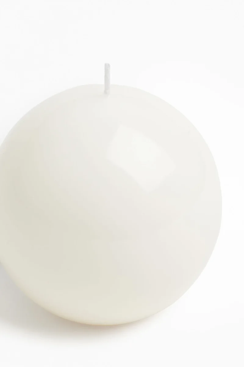 اتش اند ام شمعة بتصميم مستدير