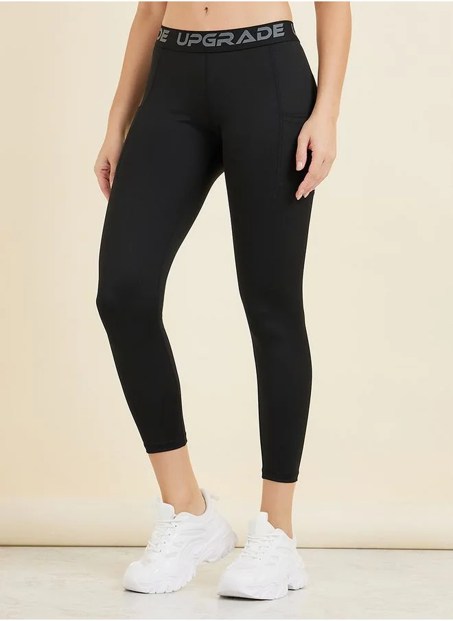ستايلي Text Tape Waist & Pocket Detail 7/8 Leggings