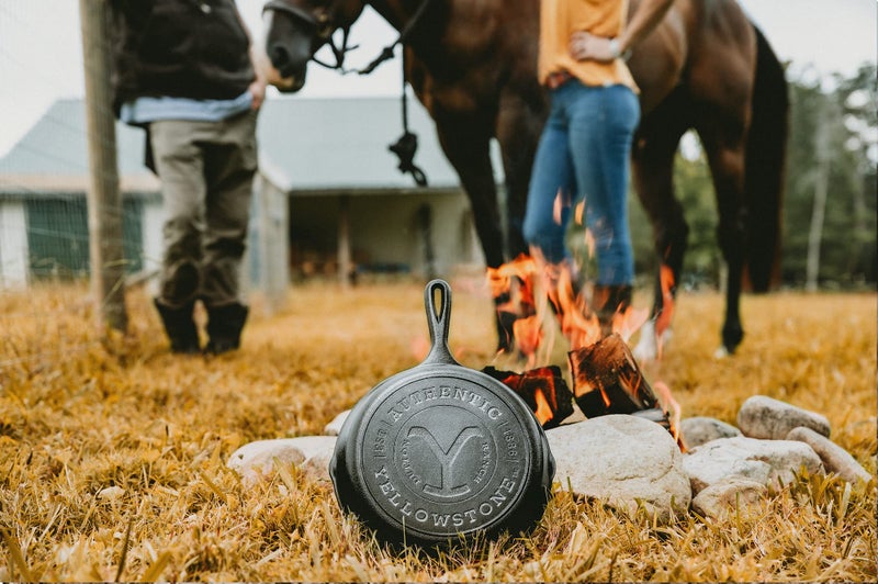 Lodge Pre-Seasoned Yellowstone Stamped Cast Iron Cookware - Signature Teardrop Handle - Use in the Oven, on the Stove, on the Grill, or Over a Campfire - 10.25 Inch Logo Skillet - Image 3