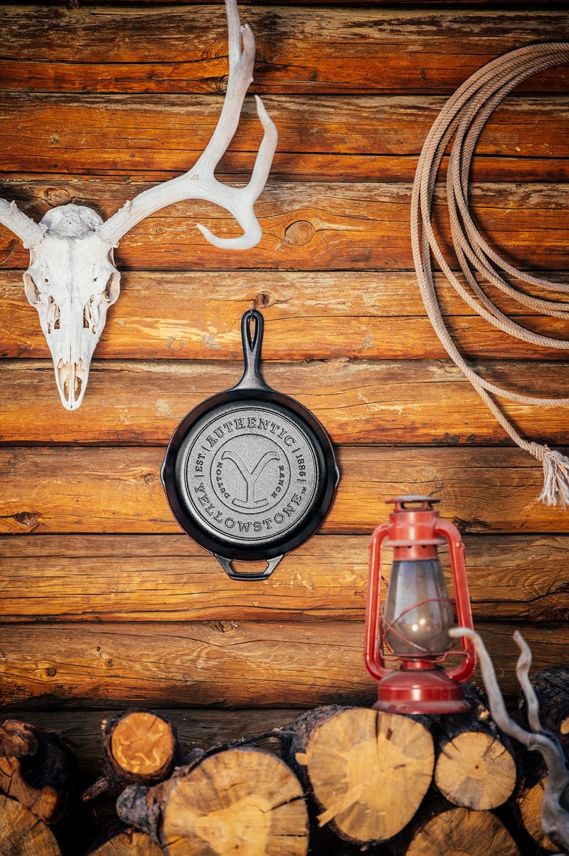 Lodge Pre-Seasoned Yellowstone Stamped Cast Iron Cookware - Signature Teardrop Handle - Use in the Oven, on the Stove, on the Grill, or Over a Campfire - 10.25 Inch Logo Skillet - Image 2