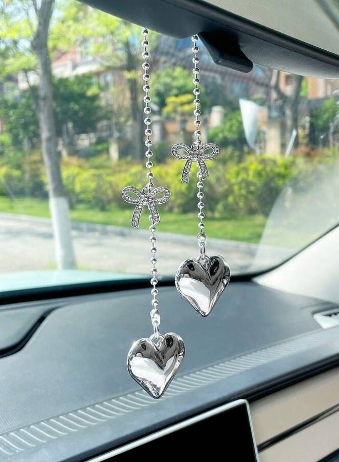 تعليقة سيارة كريستال على شكل قلوب مزينة بعقد على شكل فيونكة بتصميم أنيق تضيف لمسة فاخرة لديكور السيارة الداخلي - Image 1