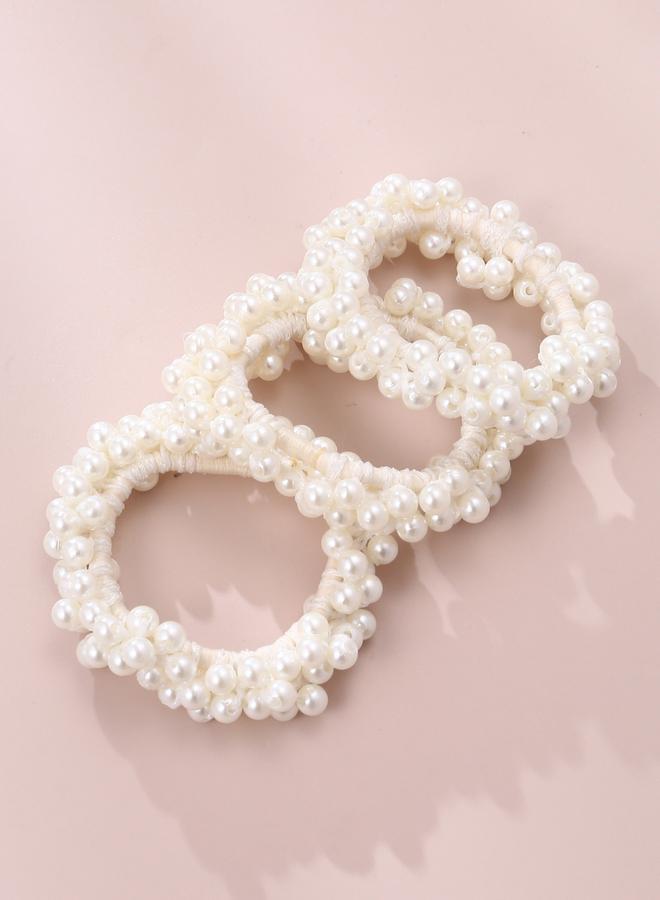 تايك تو طقم من  ربطات شعر بلؤلؤ صناعي - Image 3