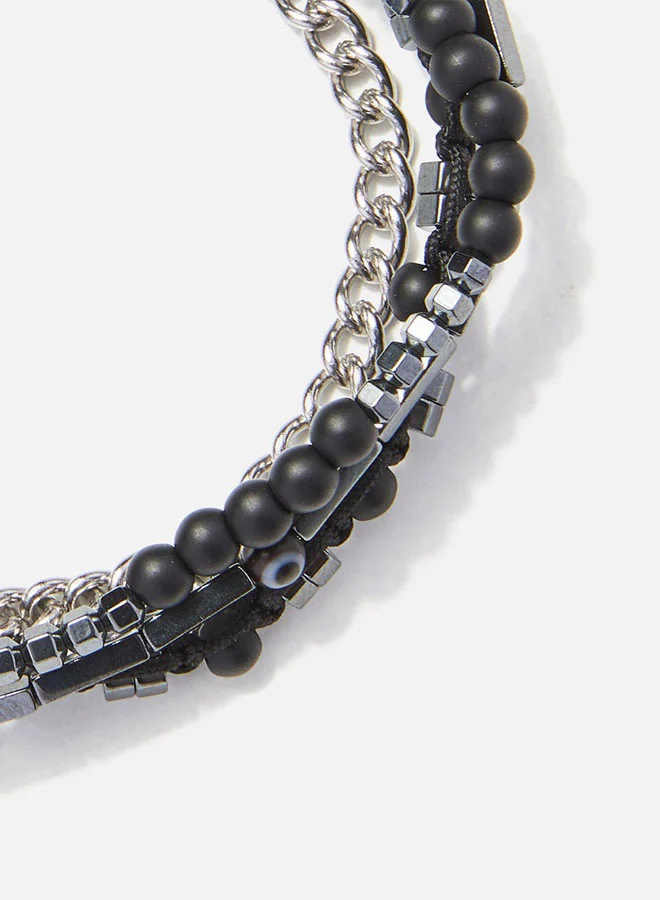 CHRYSOSTOMOS Handmade Adjustable Beaded Multi-Line Bracelet with Black Onyx, Hematite Nut, Tube, Black Glass Eye and Silver Brass Chain