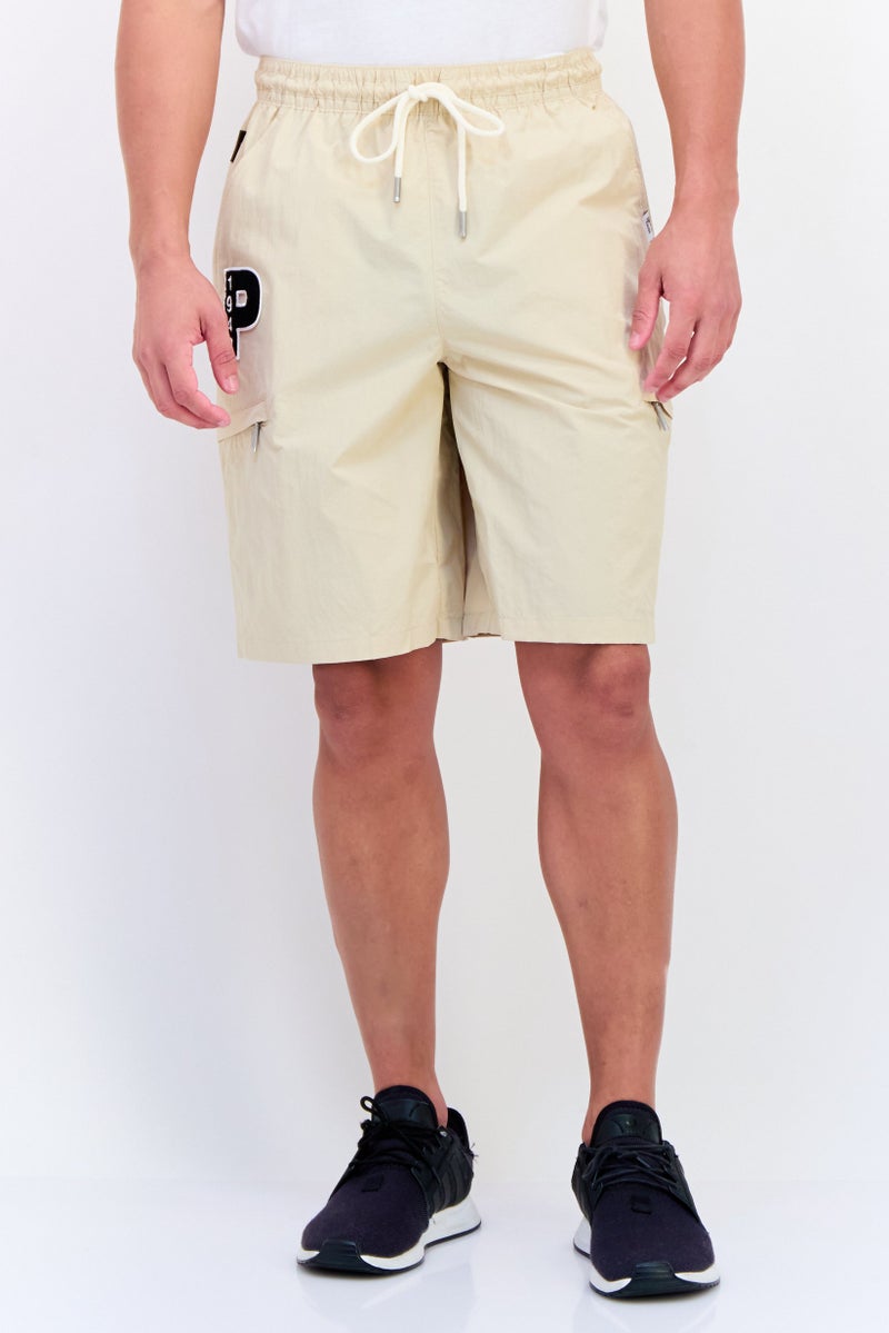 PUMA شورتات رياضية خارجية للرجال من بومة، بيج - Image 1