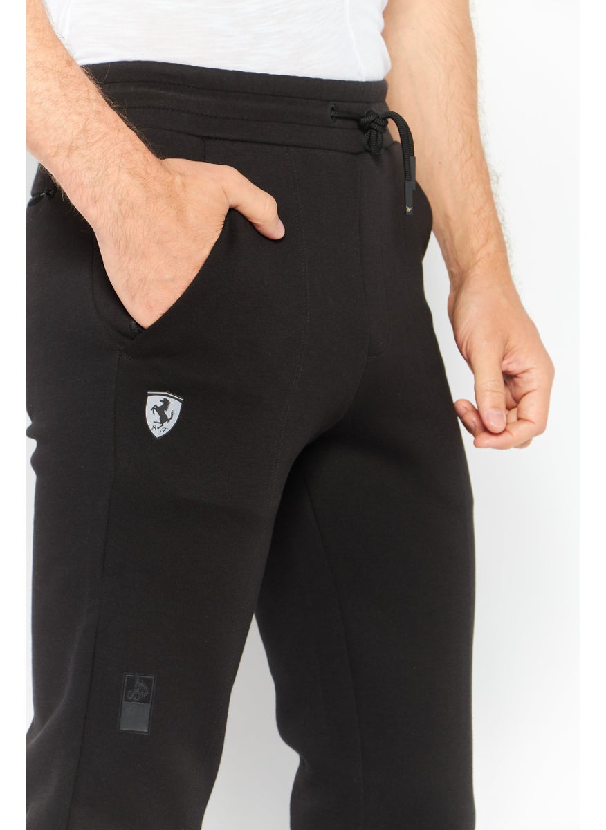 Puma x Ferrari - Men Sportswear Fit Training Pant, Black - Image 1