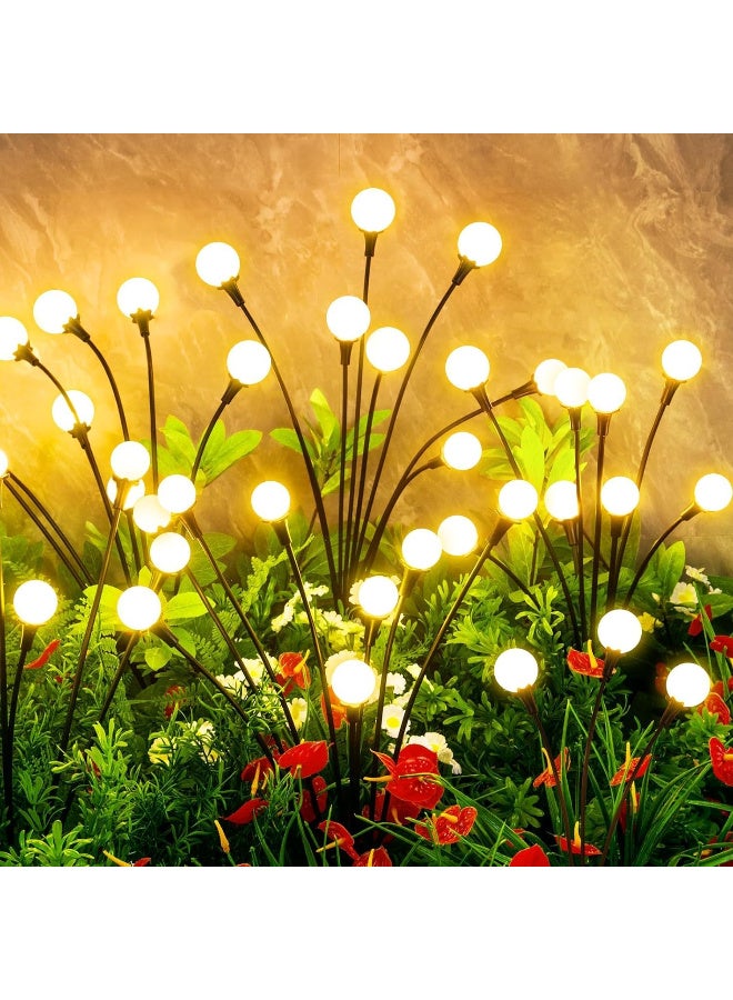 مصابيح شمسية خارجية فريدة مقاومة للماء، مجموعة من 4 قطع تحتوي على 32 مصباح LED، إضاءة حدائق وفناء بتصميم اليراعات للإضاءة الخارجية - Image 1