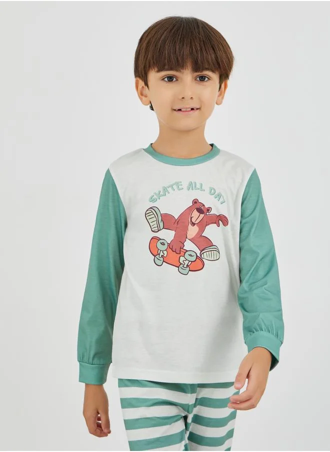 ستايلي Styli Graphic Print Round Neck T-Shirt and Striped Pyjama Set