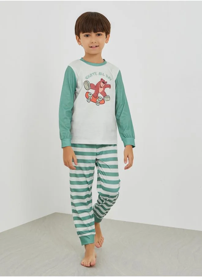 ستايلي Styli Graphic Print Round Neck T-Shirt and Striped Pyjama Set