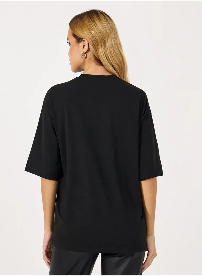 Styli Slogan Print Round Neck Oversized T-Shirt