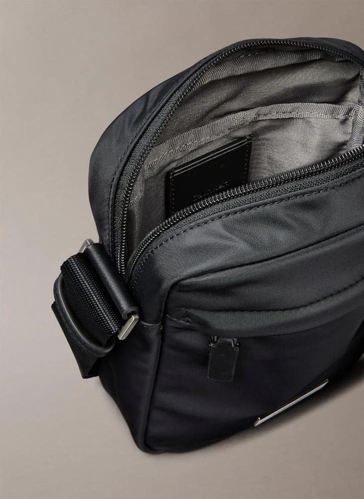 CALVIN KLEIN SLEEK REPORTER