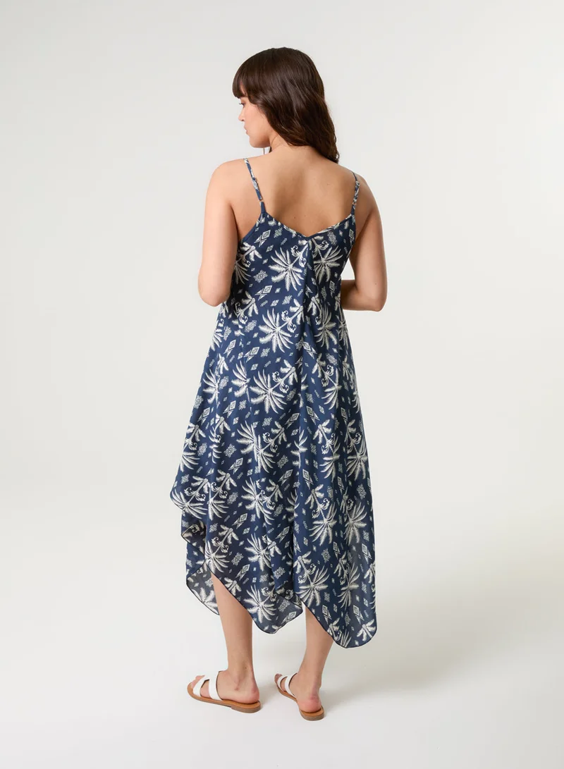 بلو فانيلا فستان بطبعة استوائية وحافة غير متساوية