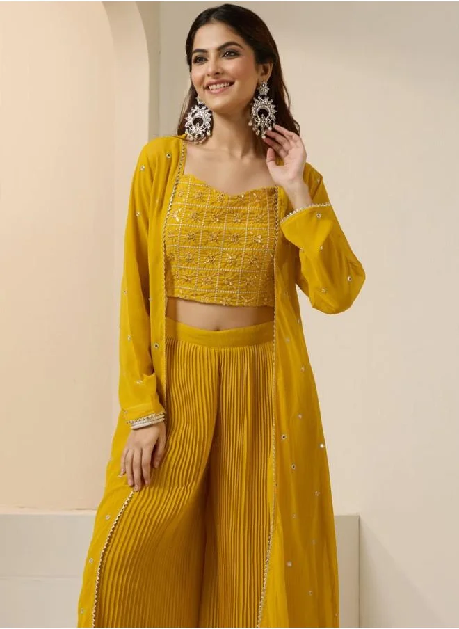 آي شين Yellow Women Yellow Georgette Co-ords with Embroidered pattern Tunic and Palazzo features a Round neckline and Three-Fourth Sleeve secured with Pull over closure and styled in Straight Fit ideal for Festive moments — perfect for fashion-forward occasions.