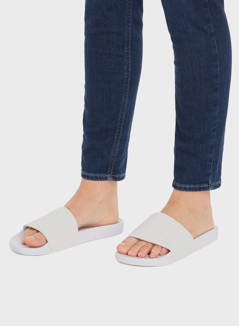 CALVIN KLEIN Monogram Pool Slides