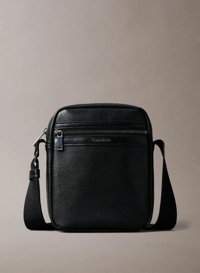 CALVIN KLEIN Textured Zip Reporter Bag - Image 1
