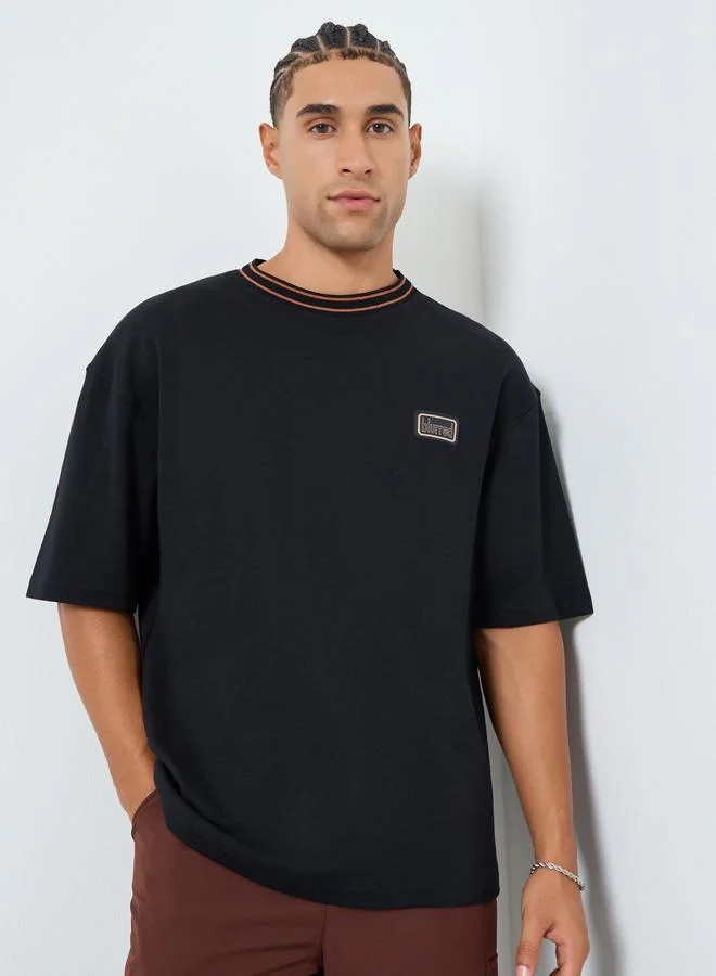 Styli Men Black Oversized Chest Patch T-Shirt