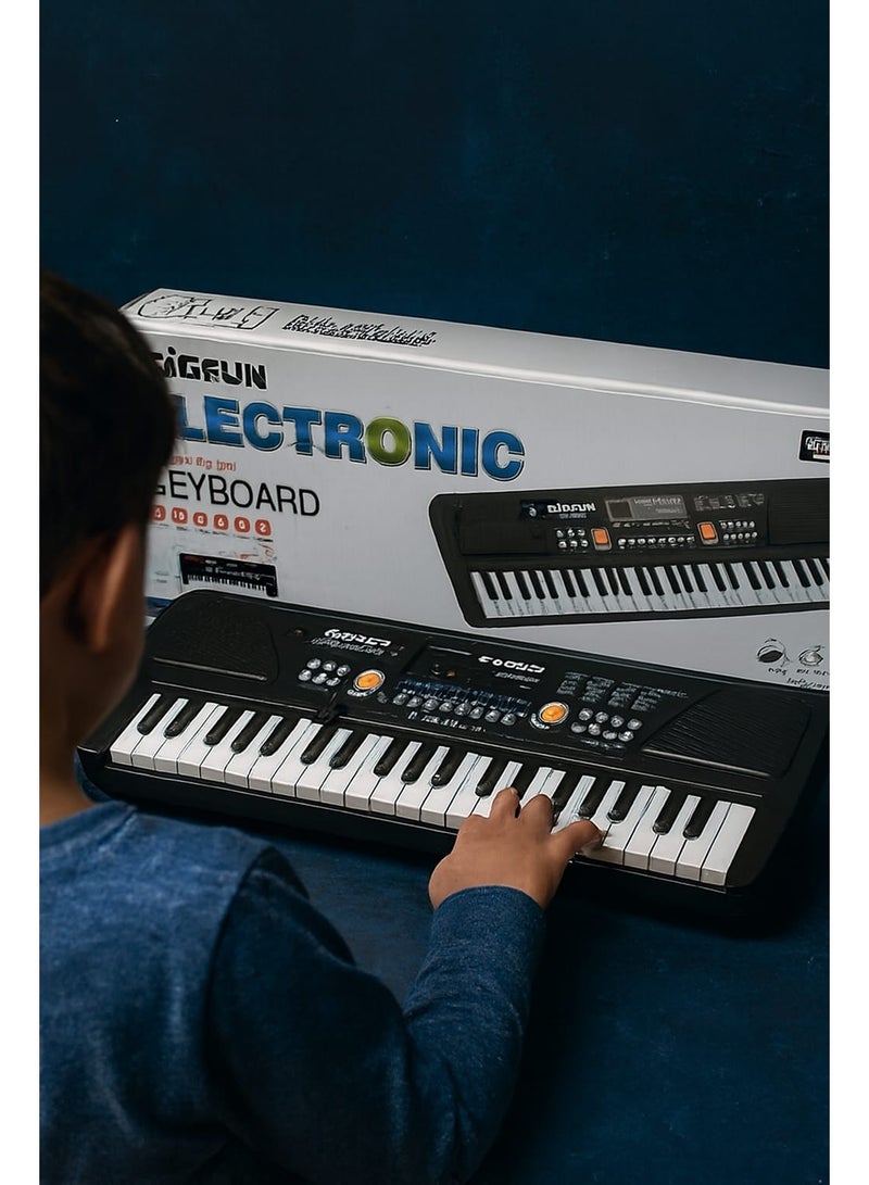 Educational Electronic Piano for Children – Interactive Musical Keyboard with Multiple Tones and Rhythms. Let your child discover their passion for music with this wonderful electronic keyboard. Designed specifically for young beginners, it combines fun and learning. Thanks to its convenient size and lightweight design, your child can play anywhere and develop their musical talents from a young age. - Image 2