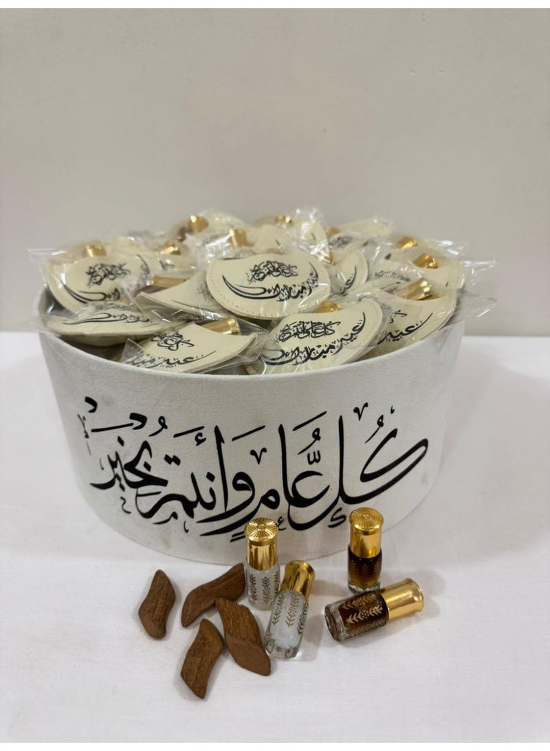 توزيعات عيديه دهن عود مع كسرة عود وعباره كل عام وانتم بخير - Image 1