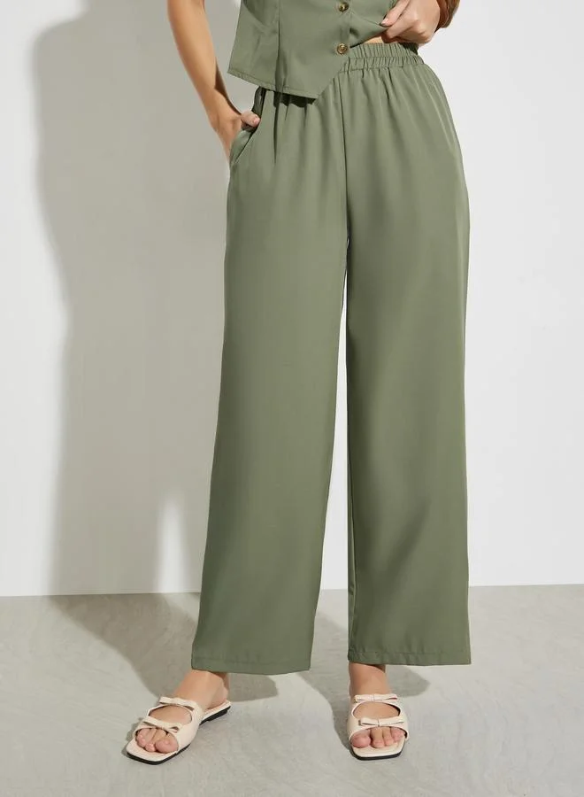 Styli Olive Olive Sleeveless Waistcoat and Wide Leg Pants Co-Ords for Women | Best Price UAE