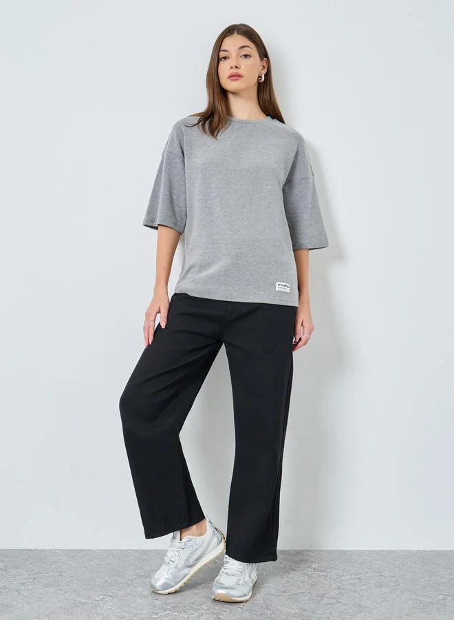 ستايلي تيشيرت محبوك بقصة واسعة