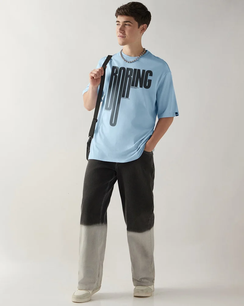 bewakoof  Men's Chambray Blue Boring Typography Oversized T-shirt  | Best Price UAE