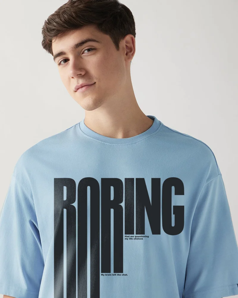bewakoof  Men's Chambray Blue Boring Typography Oversized T-shirt  | Best Price UAE
