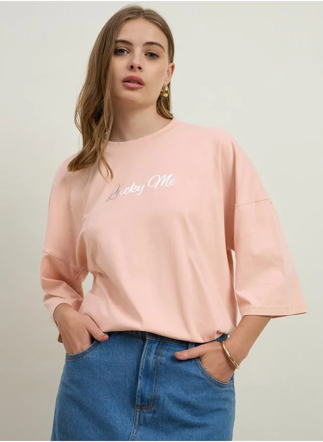 ستايلي Styli Acid Washed Lucky Me Slogan Foil Print Exaggerated Shoulder Oversized T-Shirt