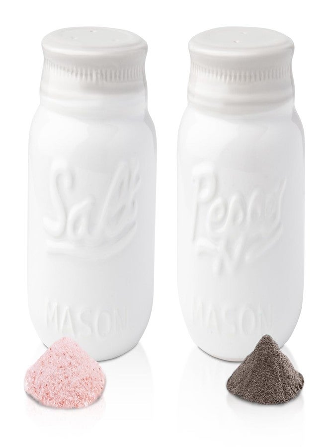 كومفيفي طقم هزازات ملح وفلفل من كومفيفي، مصنوع من السيراميك الأبيض والأزرق الفاتح، بتصميم ريفي أنيق. - Image 1