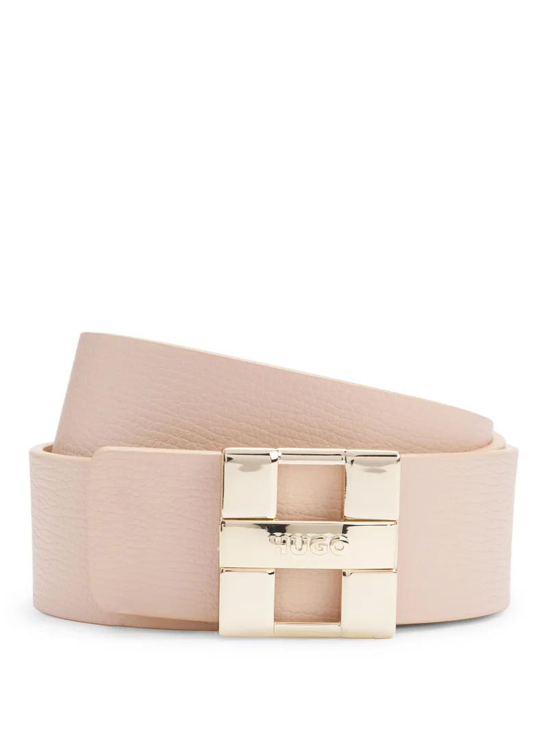 هوجو Reversible belt in smooth and grained Italian leather