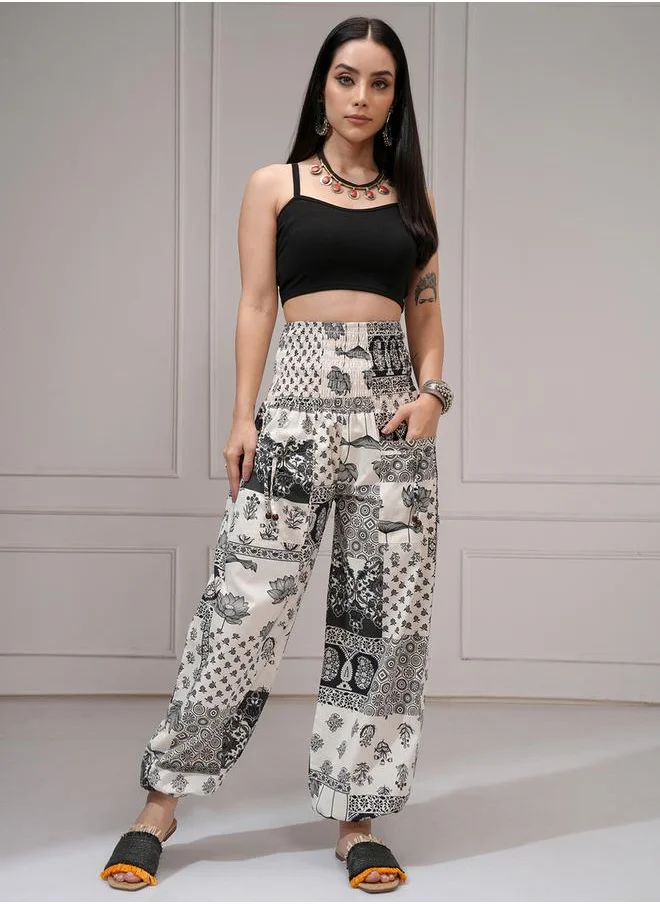 Vishudh All-Over Printed Smocked Waistband Cuffed Pants by Styli