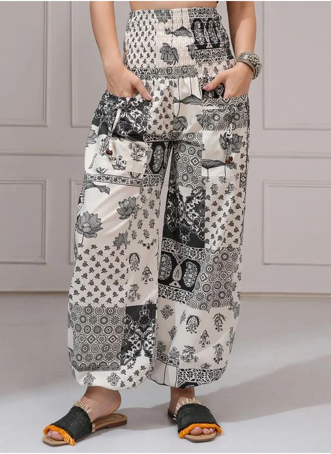 Vishudh All-Over Printed Smocked Waistband Cuffed Pants by Styli