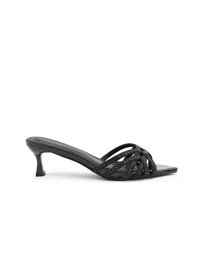 أيقون Heel slipper with rhinestone and bow details.