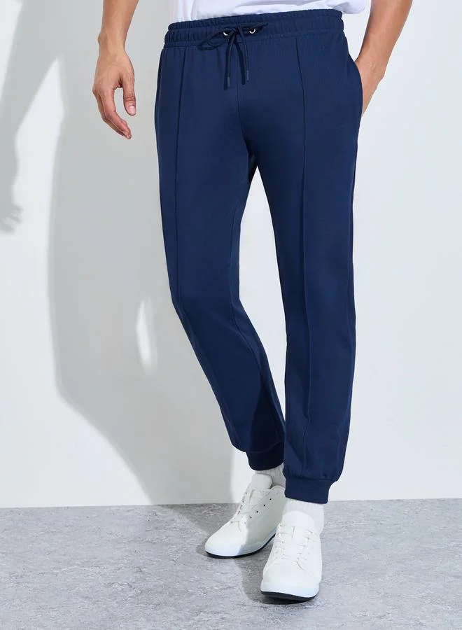 ستايلي Men Navy Blue Solid Slim Fit Cuffed Joggers