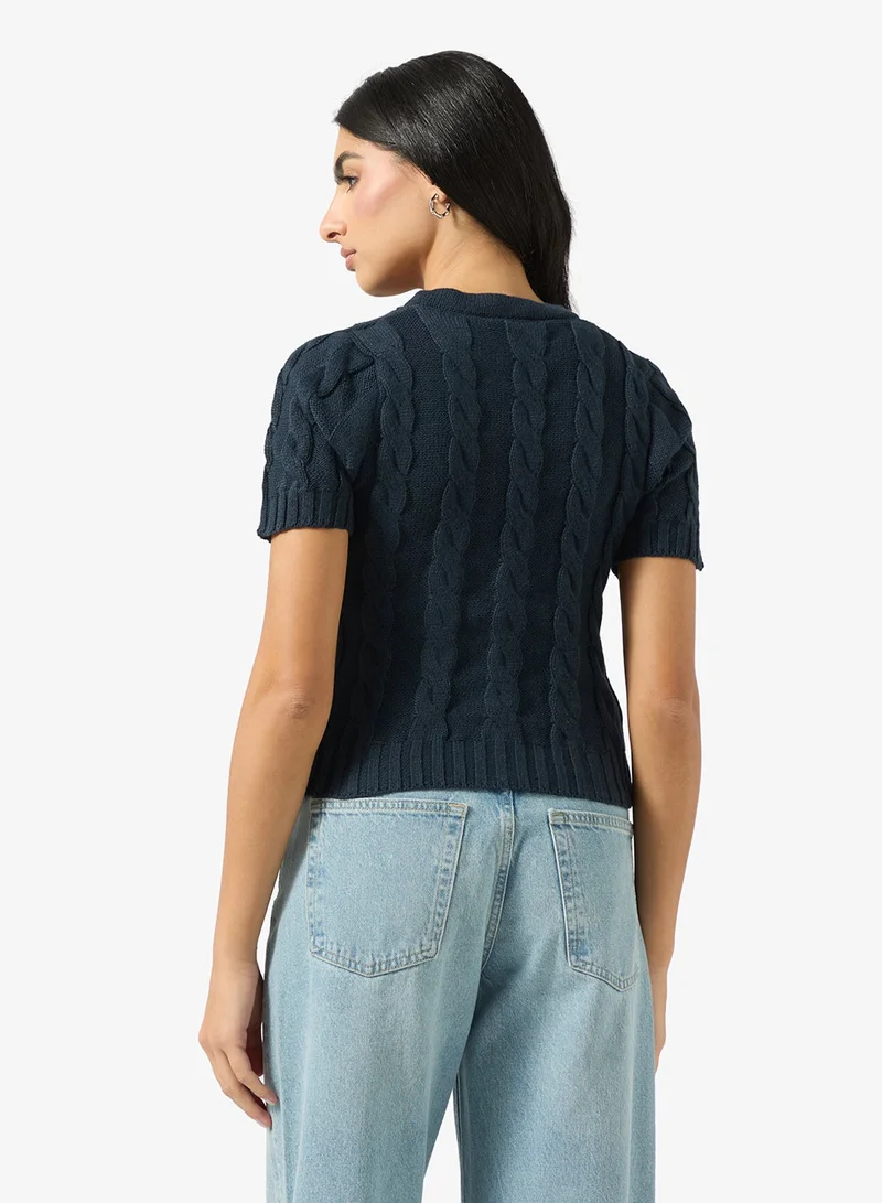 ايلا كارديجان محبوك بالكابل