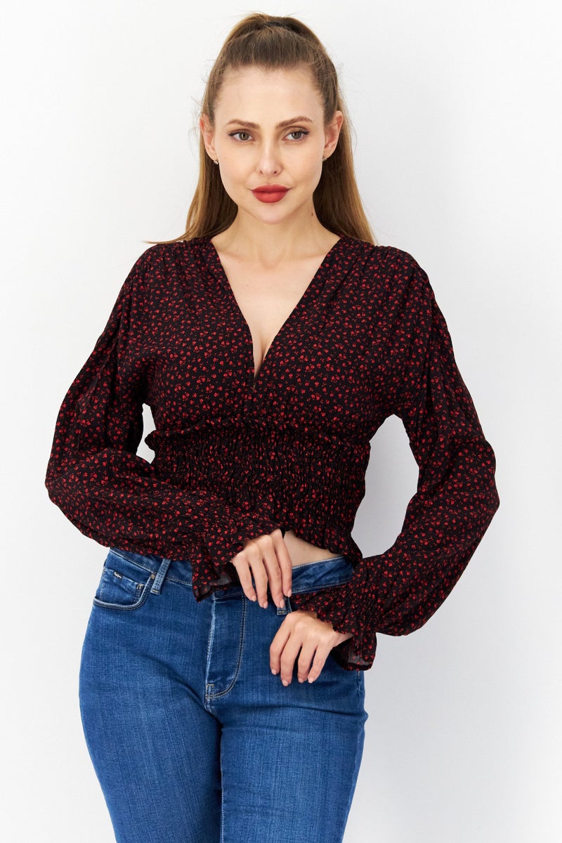 NA-KD بلوزة نسائية بأكمام طويلة وفتحة على شكل حرف V بطبعة زهور، سوداء - Image 1