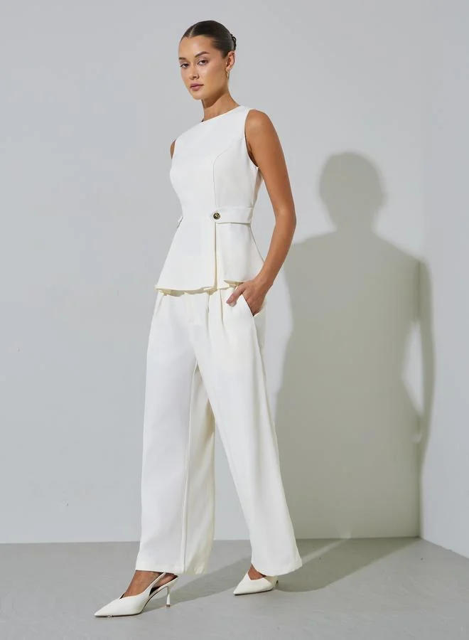 ستايلي Off White Sleeveless Button Details Pleated Peplum Top